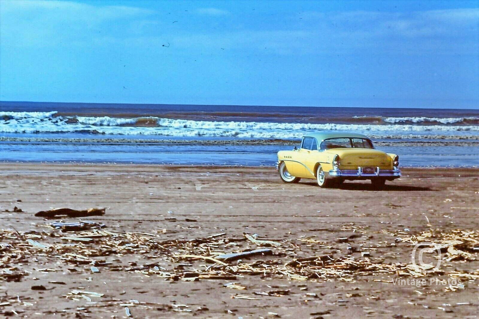 1957 American Classic Yellow Car on Beach