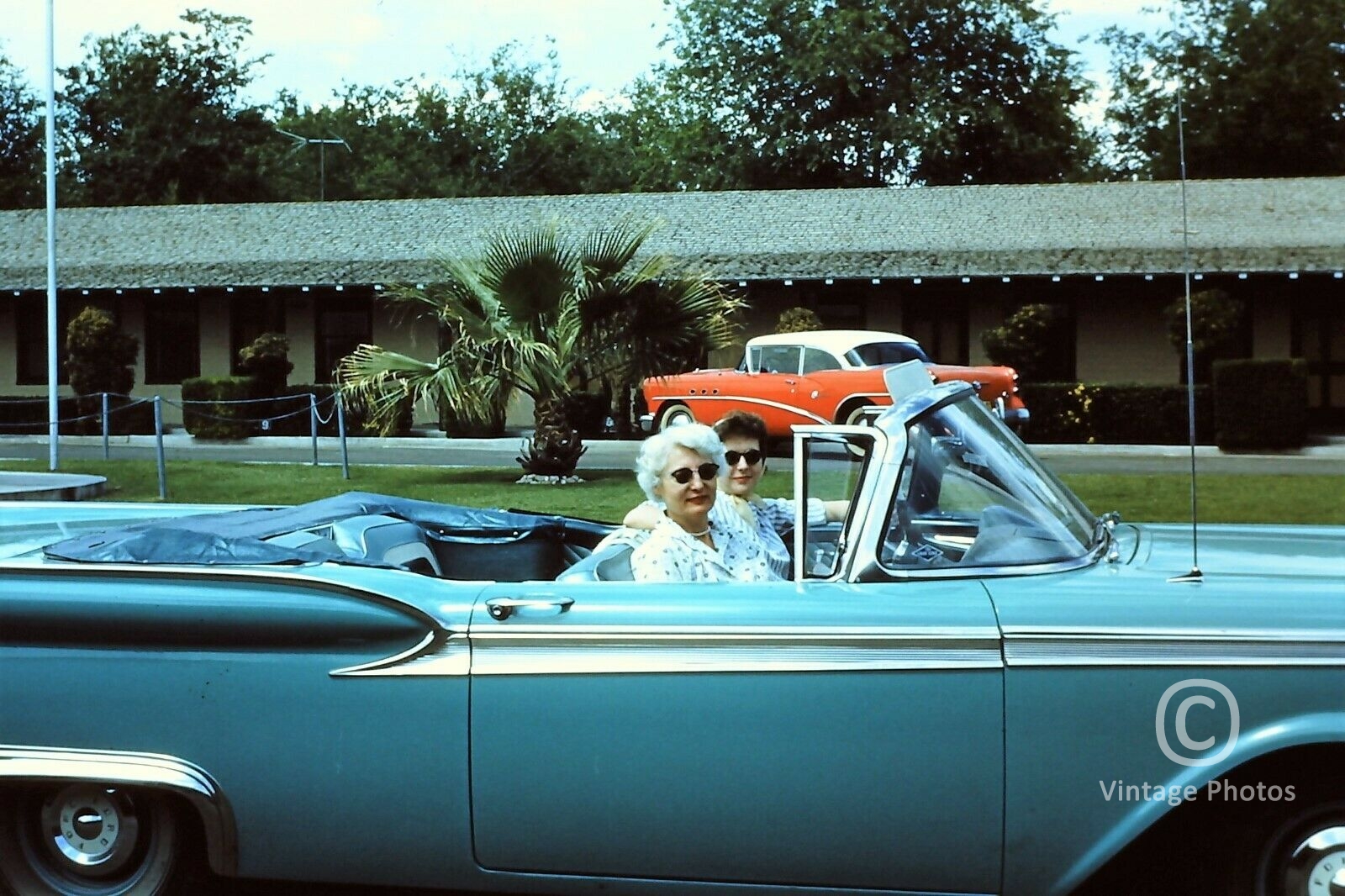 1959 American Classic Blue Convertible Car & 2 Women
