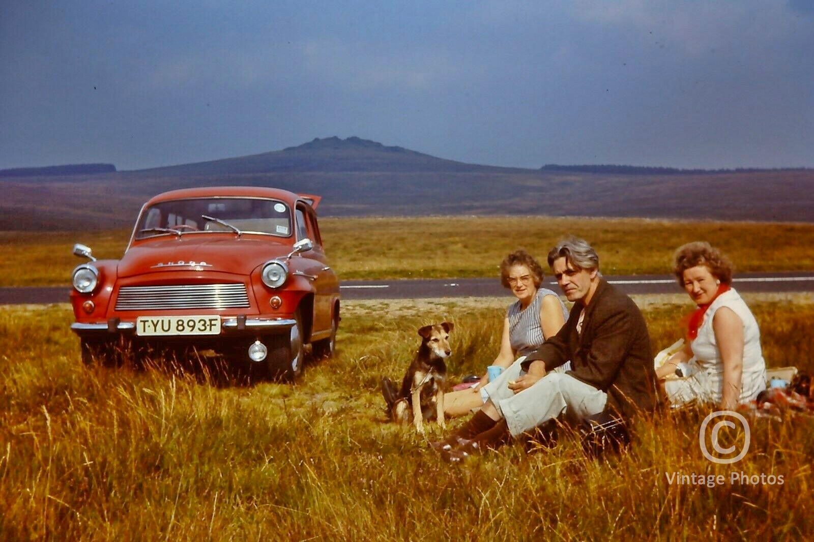 1967 Red Skoda and road side family picnic on the Moors