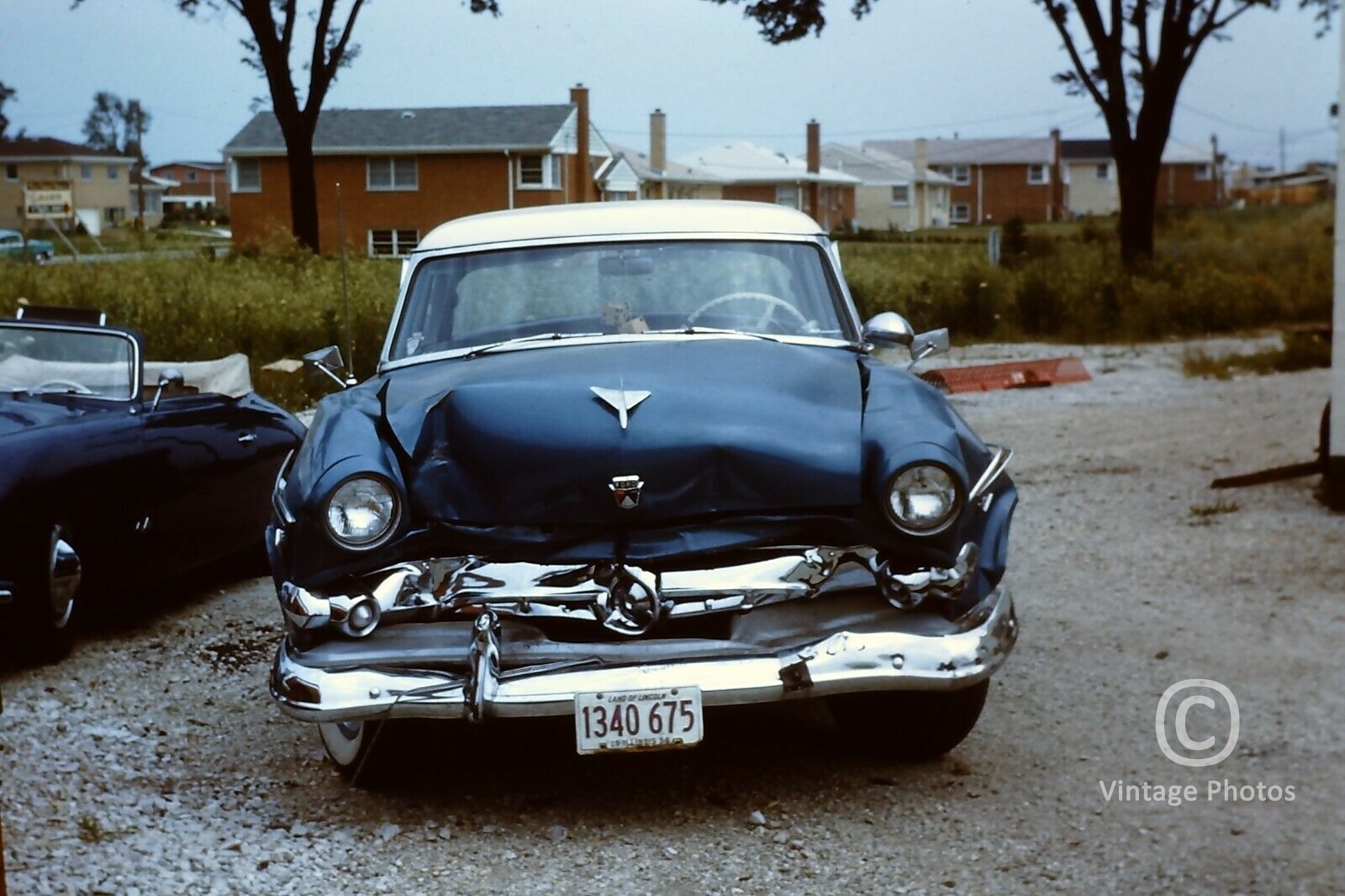 1960s Classis American Blue Ford Automobile with Dented Front