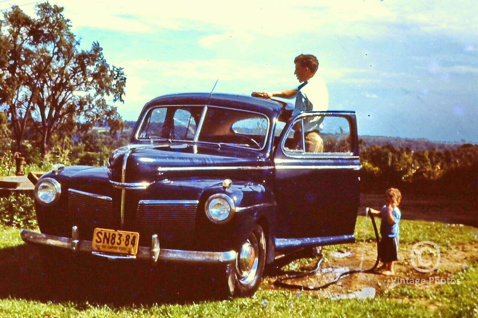 1949 Blue Classic Car & Child