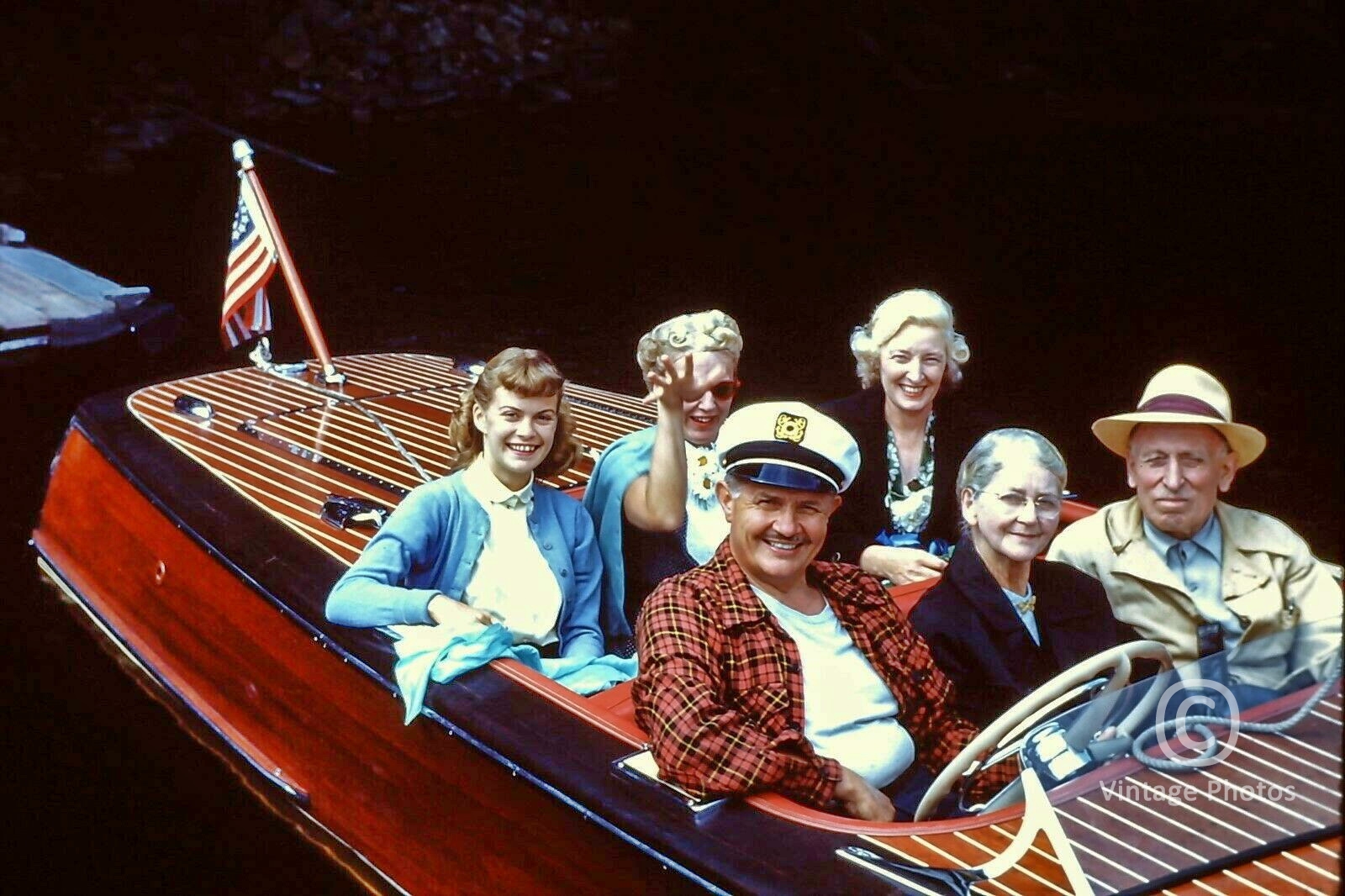 1950s American Family in classic Speed Boat