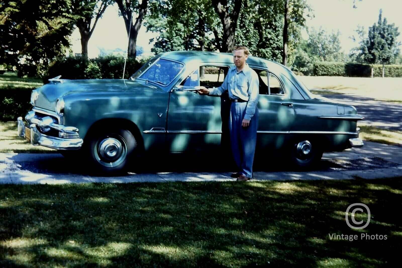 1952 American Classic Car & Man Standing